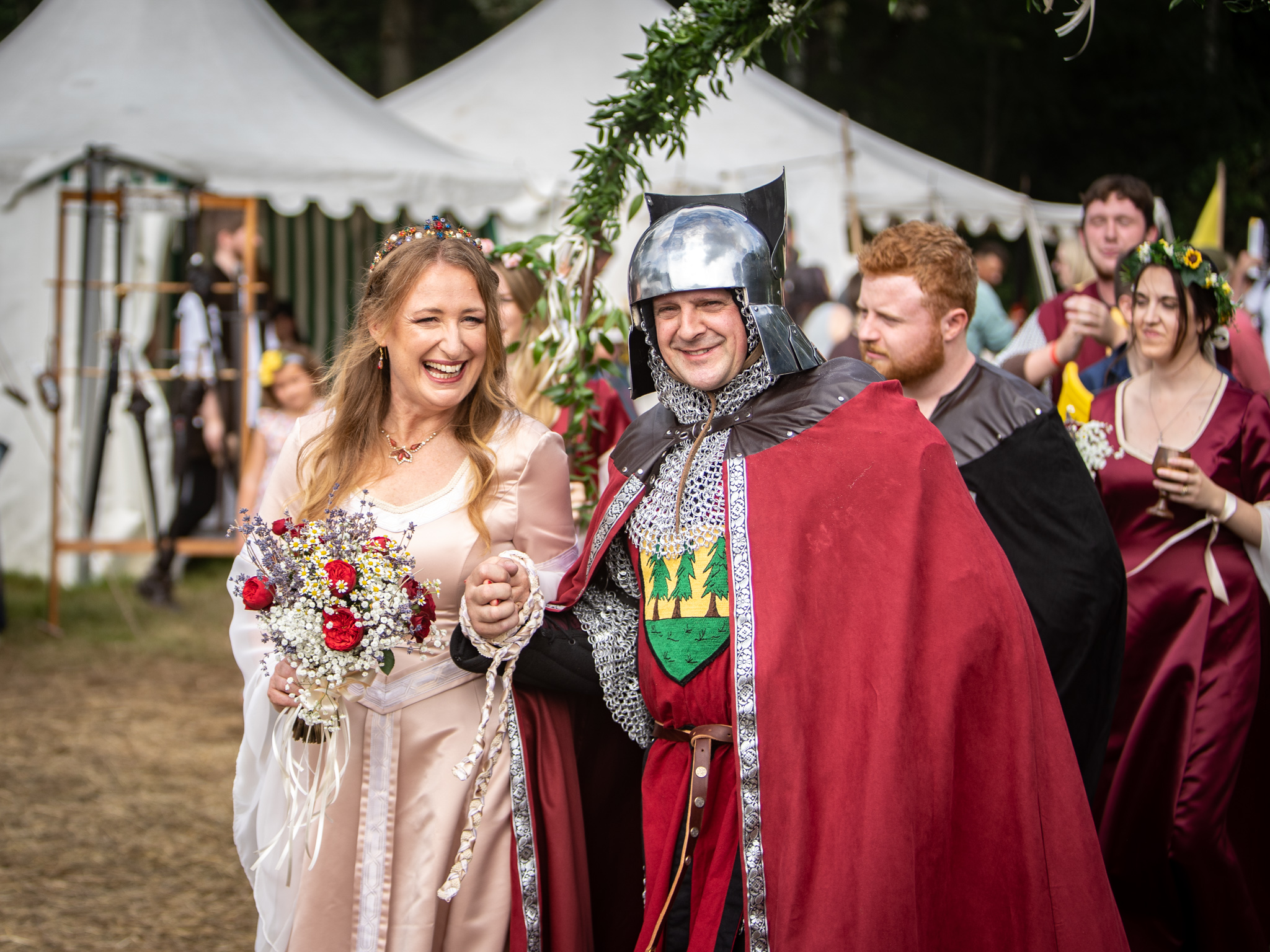 A newly-wed couple in arms stroll through the Kingdom of Loxwood
